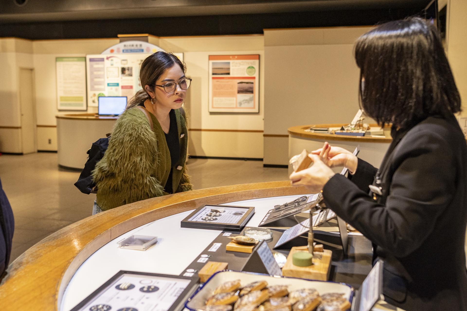 Learning about the pearl-making process from staff at the Mikimoto Pearl Island museum. They are very knowledgeable and were happy to answer many of my curious questions.