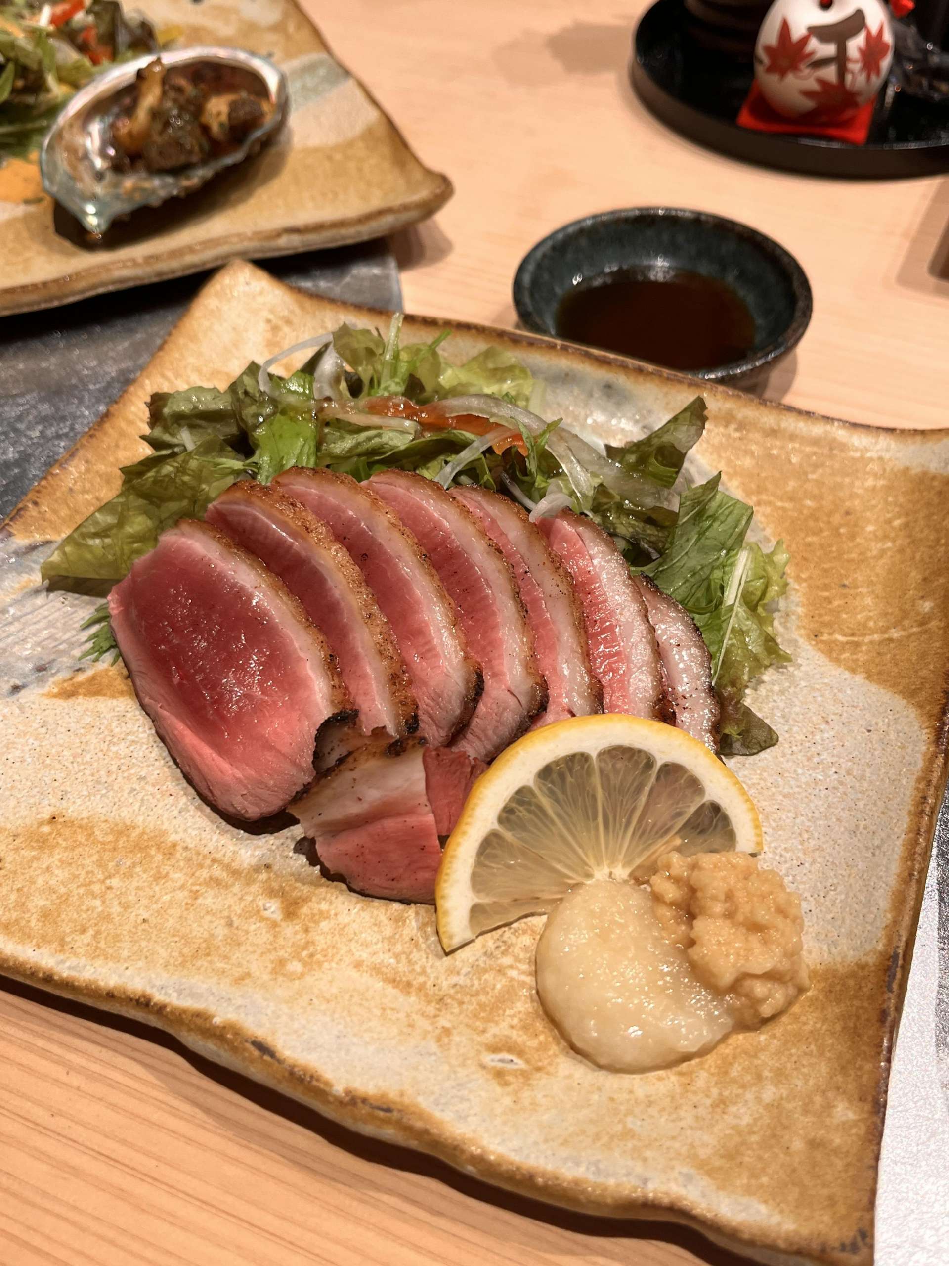 The cuisine features seasonal ingredients sourced from Osaka, varying with each season.