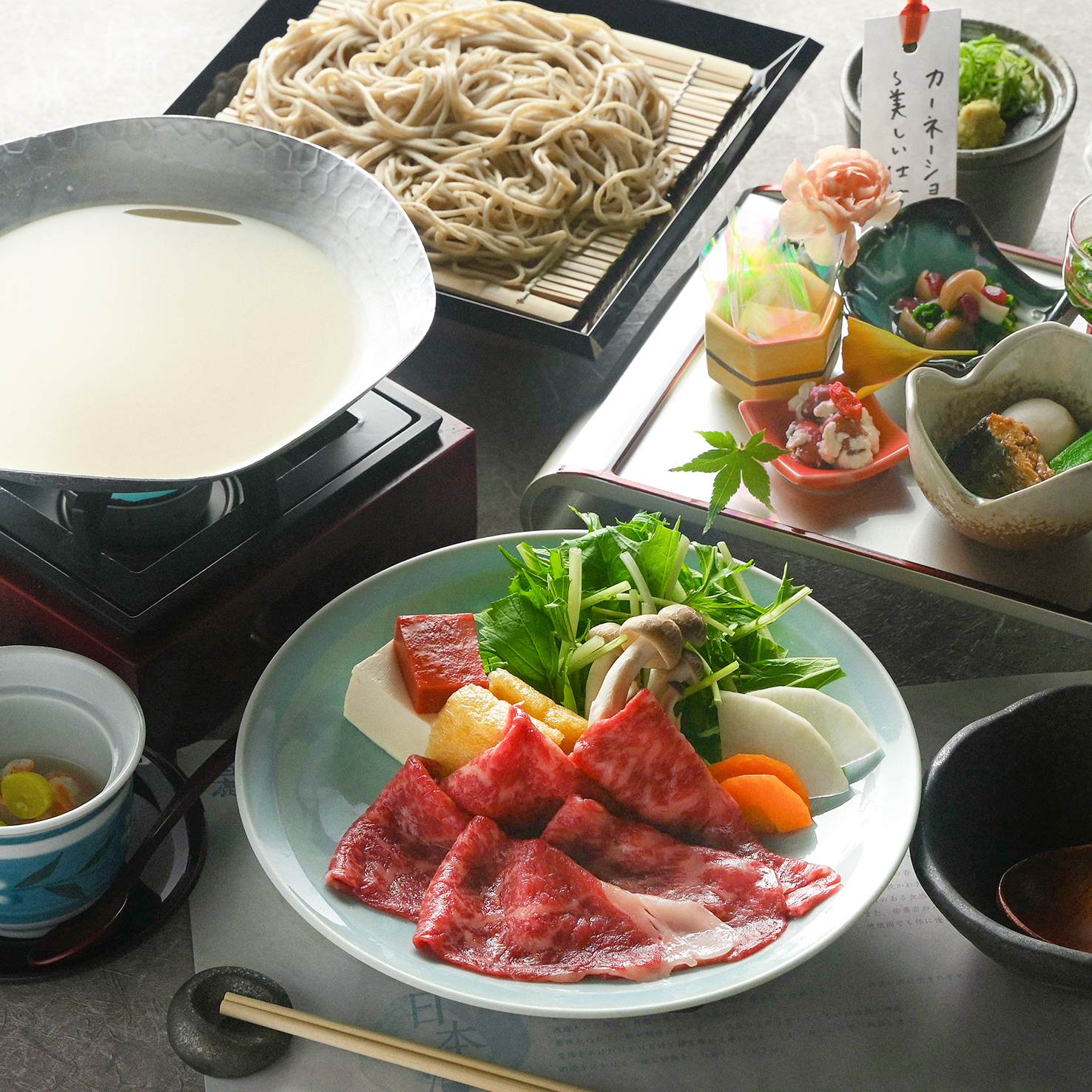 Course menus including sake lees soup, 100% buckwheat soba, and flower basket dishes start from 5,500 yen.