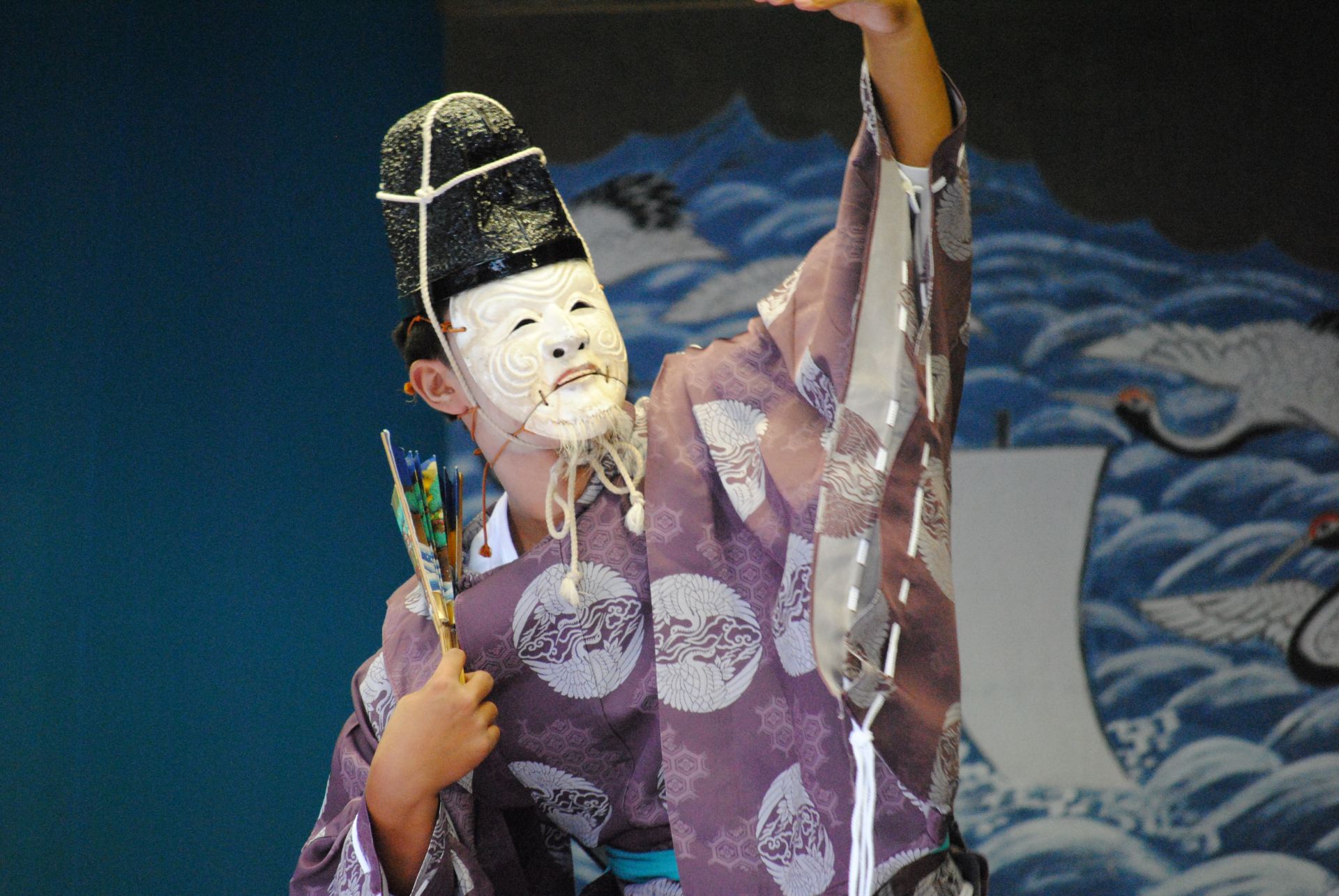 Performing the Okinoura Sanbanso, a dynamic, powerful dance.