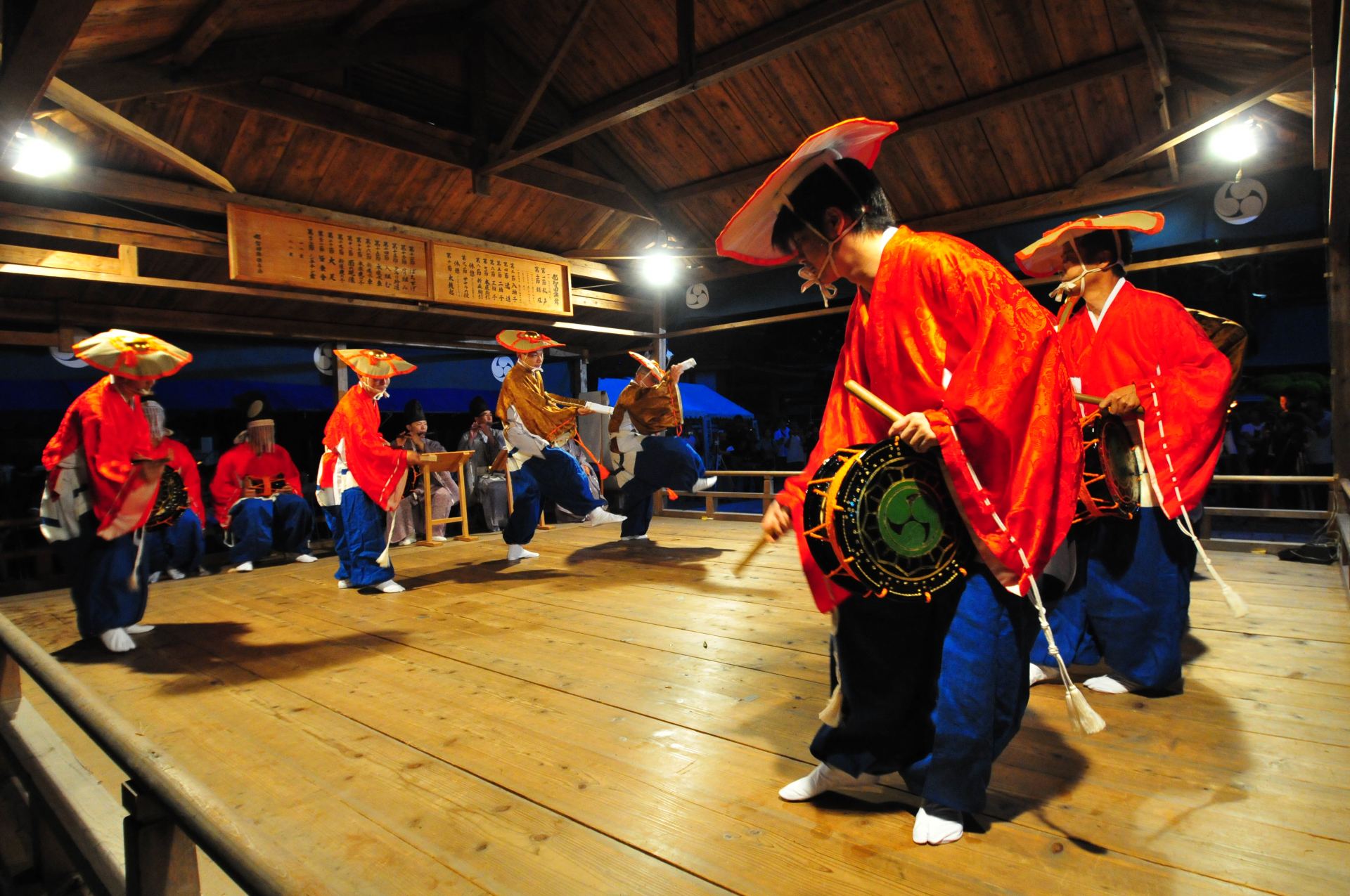 The dynamic dance and brilliant red, yellow, and blue costumes are eye catching.