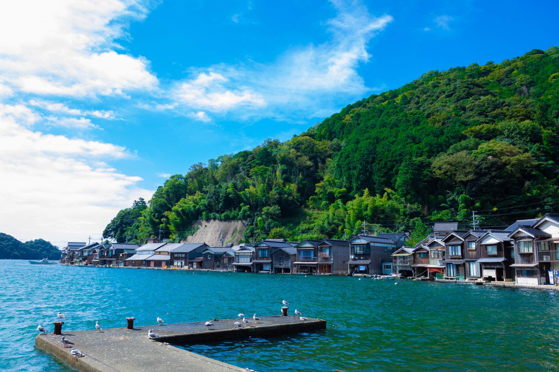 Nostalgic vista of Ine’s boathouses. 