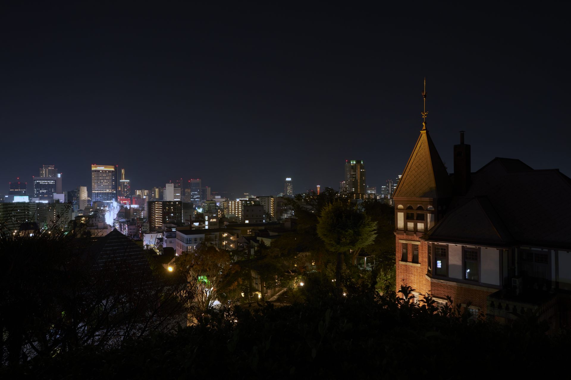 A sweeping view of Kobe at night as seen from the shrine grounds after dark. It truly is the shrine in the sky.