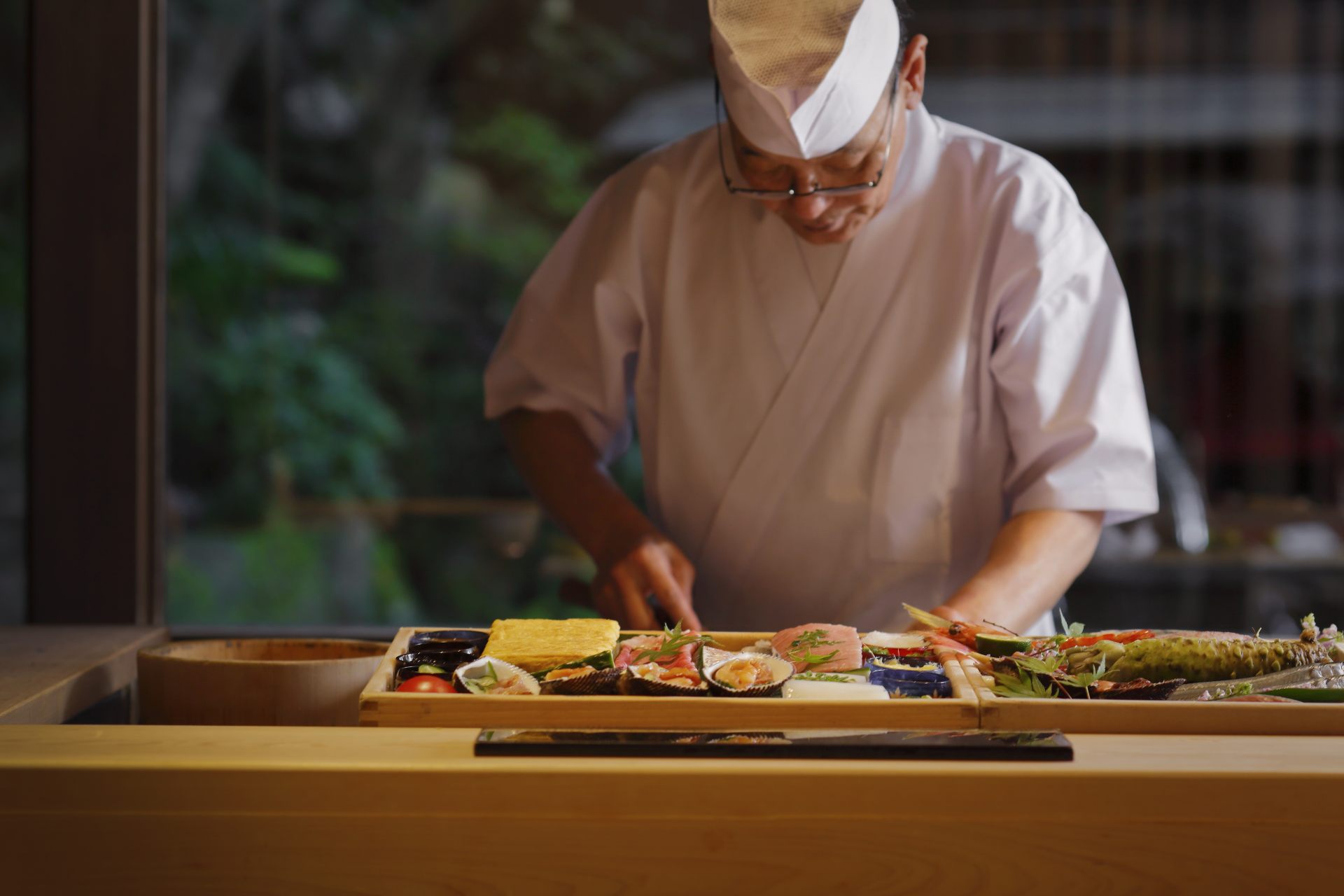 For dinner, partake in the finest sushi, where a skilled chef wields their skills right in front of your eyes.