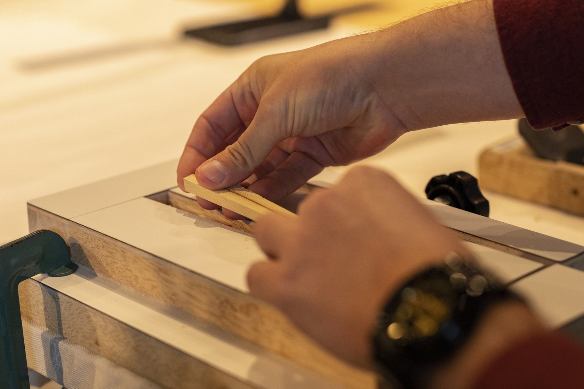 Raw bamboo chopsticks are prepared for shaping.