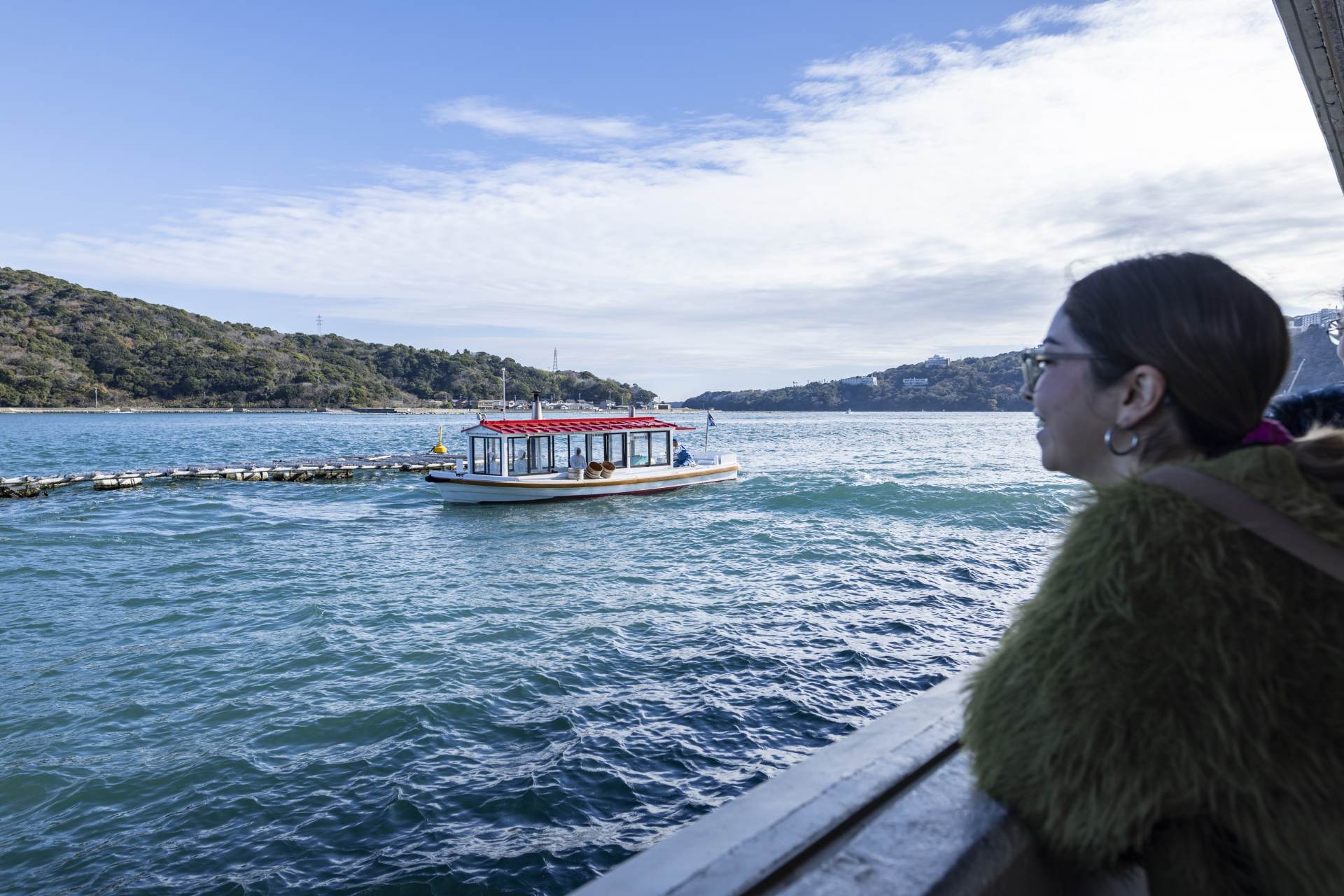 Watching the pearl diving demonstration by ama diver women at Mikimoto Pearl Island, one of their most sought-after attractions.