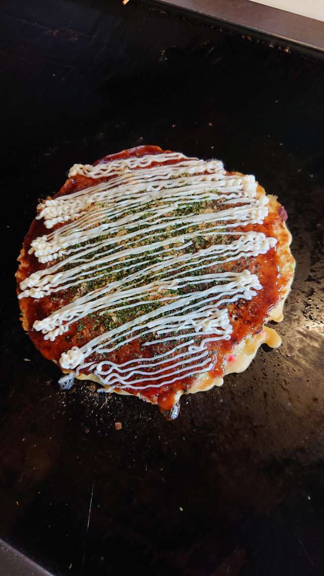Okonomiyaki characterized by the texture of Crisp! Fluffy! 