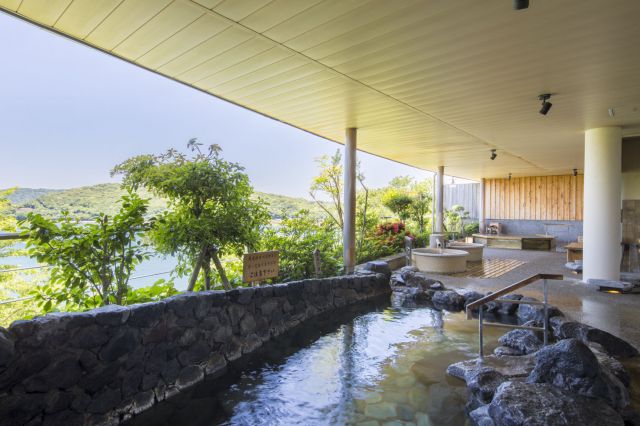 An open-air bath in one of the large bathing areas from which Toba Bay can be seen.