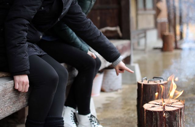 Lighting the wooden candle