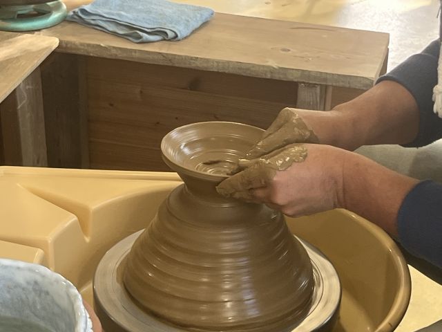 Electric potter's wheel experience instructed by a pottery artist
