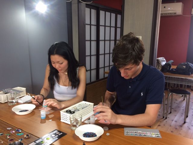 Scene of creation during the cloisonne-making experience 2