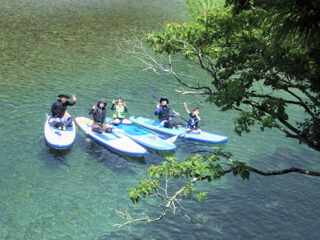 Relaxed SUP play in the clear river waters