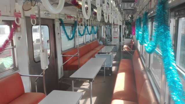 Interior of a chartered Hankai Tramway rail car (Illustrative image)