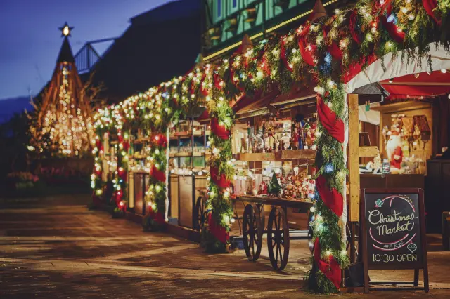 Kobe Christmas Market - Christmas at the Castle - features a 6-meter wooden Christmas tower, authentic German ornaments, advent calendars, nutcrackers, and smoking man dolls.