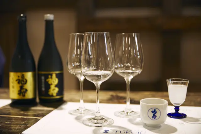 Paid tasting experience. Glasses are carefully selected to match the type of sake being served.
